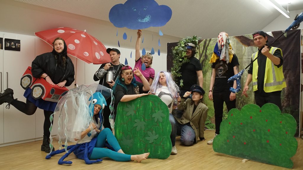 The team of music makers assembled in a variety of costumes for a final photo shoot.